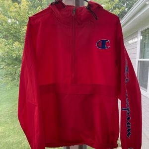 Never worn in good condition Red champion red wind breaker Size women’s large